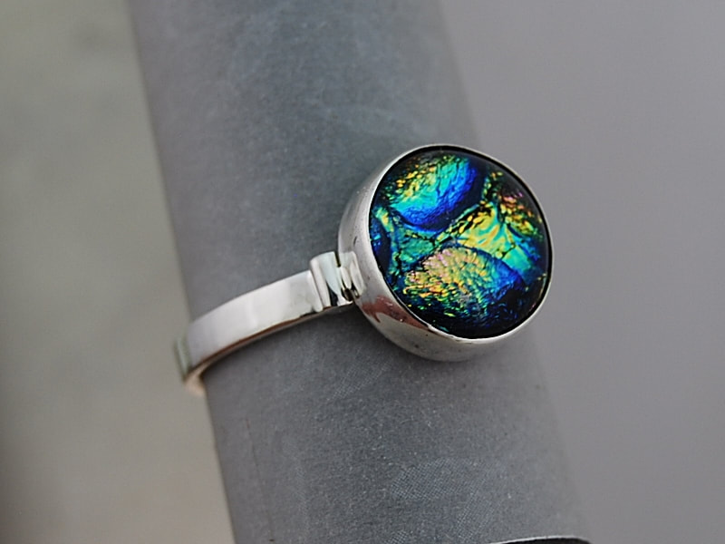 bezel set dichroic glass on sterling silver ring with sturdy band size 9.75