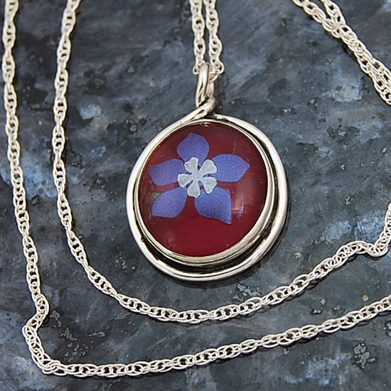 lavender and silver dichroic mica columbine kiln fused to red glass in sterling silver pendant